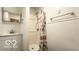 Bathroom featuring a vanity with a mirror, shower, and a white shower curtain at 283 N Brooks St, Columbus, IN 47201