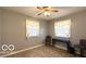 Bedroom with natural light, wood-look floors, and neutral walls and furnishings at 283 N Brooks St, Columbus, IN 47201