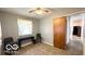 Bedroom with neutral-colored walls and wood-look flooring at 283 N Brooks St, Columbus, IN 47201