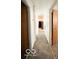 Hallway that opens up into a room with appliances at 283 N Brooks St, Columbus, IN 47201