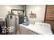 A functional laundry area features a washer, dryer, and essential utility fixtures for household convenience at 283 N Brooks St, Columbus, IN 47201