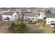 Aerial view of a home showcasing the deck, backyard and surrounding neighborhood at 2879 Bluewood Way, Plainfield, IN 46168