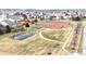 Aerial view of community amenities, including basketball courts and tennis courts at 2879 Bluewood Way, Plainfield, IN 46168