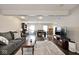 Spacious open-concept living area featuring modern decor, sleek floors, and plenty of room to relax at 2879 Bluewood Way, Plainfield, IN 46168