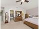 Bright main bedroom with vaulted ceiling, walk-in closet, and ensuite bathroom access at 2879 Bluewood Way, Plainfield, IN 46168