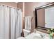 Compact bathroom featuring a toilet, sink, and shower at 2912 Tuscarora Ln, Indianapolis, IN 46217