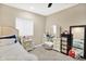 Bright bedroom with a vanity and a large window, creating a serene and inviting atmosphere at 2912 Tuscarora Ln, Indianapolis, IN 46217