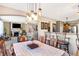 Bright dining area featuring an open floor plan, and modern lighting fixtures at 2912 Tuscarora Ln, Indianapolis, IN 46217