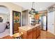 Spacious kitchen boasting wooden floors, stainless steel appliances, and a granite island at 2912 Tuscarora Ln, Indianapolis, IN 46217