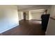 Finished basement featuring laminate flooring and modern lighting, with access to other rooms at 3766 N Lakeside Dr, Muncie, IN 47304