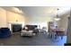 Spacious living room featuring a fireplace, dark hardwood floors, comfortable seating and natural light at 3766 N Lakeside Dr, Muncie, IN 47304