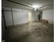 Spacious two car garage with overhead lighting and room for storage at 3837 Candle Berry Dr, Indianapolis, IN 46235