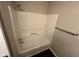 Shower stall with white surround, chrome fixtures, and grab bar at 3837 Candle Berry Dr, Indianapolis, IN 46235