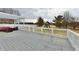 Large backyard with a deck, playset, and plenty of space for outdoor activities at 3873 Crest Point Dr, Noblesville, IN 46062