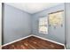 Cozy room features hard wood floors, a window and decorative wall hanging at 3873 Crest Point Dr, Noblesville, IN 46062