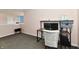 Bright office space featuring a modern desk setup, dual monitors, and comfortable seating at 3873 Crest Point Dr, Noblesville, IN 46062