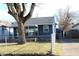 A quaint single-Gathering home is highlighted, featuring a fenced yard and a detached garage in the back at 4113 Fletcher Ave, Indianapolis, IN 46203