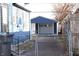 View of a backyard and blue detached garage at 4113 Fletcher Ave, Indianapolis, IN 46203