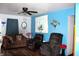 Inviting living room featuring a comfortable sofa, recliners, and stylish decor, perfect for relaxation at 4113 Fletcher Ave, Indianapolis, IN 46203