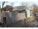 Backyard with a weathered wooden fence, showing some repairs needed on the home at 416 Ketcham St, Indianapolis, IN 46222