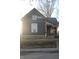 A charming home with unique architectural details and a welcoming front porch at 416 Ketcham St, Indianapolis, IN 46222