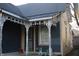 Charming porch detailing a two-tone exterior and inviting entryway at 416 Ketcham St, Indianapolis, IN 46222