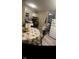Modest kitchen with matching appliances, a neutral color palette, and a dining area at 416 Ketcham St, Indianapolis, IN 46222