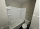 Clean bathroom with a tub and shower combination at 4616 N Kenmore Rd, Indianapolis, IN 46226