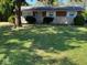 Charming one-story home with a well-maintained front yard and mature trees at 4616 N Kenmore Rd, Indianapolis, IN 46226