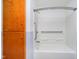 Bathtub and shower with safety bars, and built in storage at 4812 Southview Dr, Anderson, IN 46013
