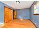 Bedroom with hardwood floors, single window, and closet at 4812 Southview Dr, Anderson, IN 46013