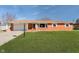 Charming single-story brick home with a well-manicured lawn, a driveway and a garage for convenient parking at 4812 Southview Dr, Anderson, IN 46013