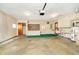 Functional two car garage features plenty of cabinet space, utility sink, and peg board at 4812 Southview Dr, Anderson, IN 46013