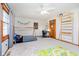This bedroom has a climbing structure, platform bed, a desk and carpeted floors at 5079 Stonespring Way, Anderson, IN 46012