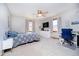 Bright bedroom featuring ceiling fan, neutral colors, and carpeted floors at 5079 Stonespring Way, Anderson, IN 46012