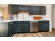 Updated kitchen with painted cabinets, stainless steel dishwasher, and ample counter space for meal preparation at 5079 Stonespring Way, Anderson, IN 46012