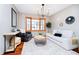 Cozy living room features a bay window, modern decor, and comfortable seating, perfect for relaxation at 5079 Stonespring Way, Anderson, IN 46012