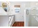 Bright bathroom with glass-enclosed shower and modern vanity at 7844 N Audubon Rd, Indianapolis, IN 46250