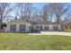 Charming brick ranch-style home with gray shutters and a well-manicured front lawn at 7844 N Audubon Rd, Indianapolis, IN 46250