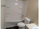 Bathroom with tub and shower combo with neutral finishes at 8002 Bryan Dr, Indianapolis, IN 46227