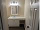 Well-lit bathroom features a vanity sink and neutral finishes at 8002 Bryan Dr, Indianapolis, IN 46227