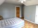 Bedroom featuring slanted ceilings, neutral paint, and natural light at 804 N Jameson St, Lebanon, IN 46052