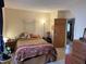 Comfortable bedroom with a cozy bed, accent decor, and soft lighting, creating a serene and inviting space at 804 N Jameson St, Lebanon, IN 46052