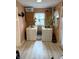 Bright laundry room with modern washer and dryer, ample counter space, and natural light, simplifying chores at 804 N Jameson St, Lebanon, IN 46052