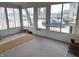 This enclosed sunroom provides natural light and an outdoor view, enhancing the home's appeal at 804 N Jameson St, Lebanon, IN 46052