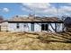 View of backyard with sliding door and patio at 8139 Laughlin Dr, Indianapolis, IN 46219