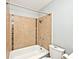 Full bathroom with tub and shower combination and decorative tile at 8139 Laughlin Dr, Indianapolis, IN 46219