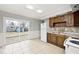 Bright dining area with tile flooring, backyard access via sliding door and great natural light at 8139 Laughlin Dr, Indianapolis, IN 46219
