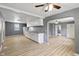 Spacious kitchen features white cabinetry, light-colored countertop, and an open layout, seamlessly blending into adjacent living areas at 818 S Grant St, Muncie, IN 47302