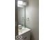 Well-lit bathroom features a modern vanity with a sleek white countertop and chrome fixtures at 8249 Retreat Ln, Indianapolis, IN 46259